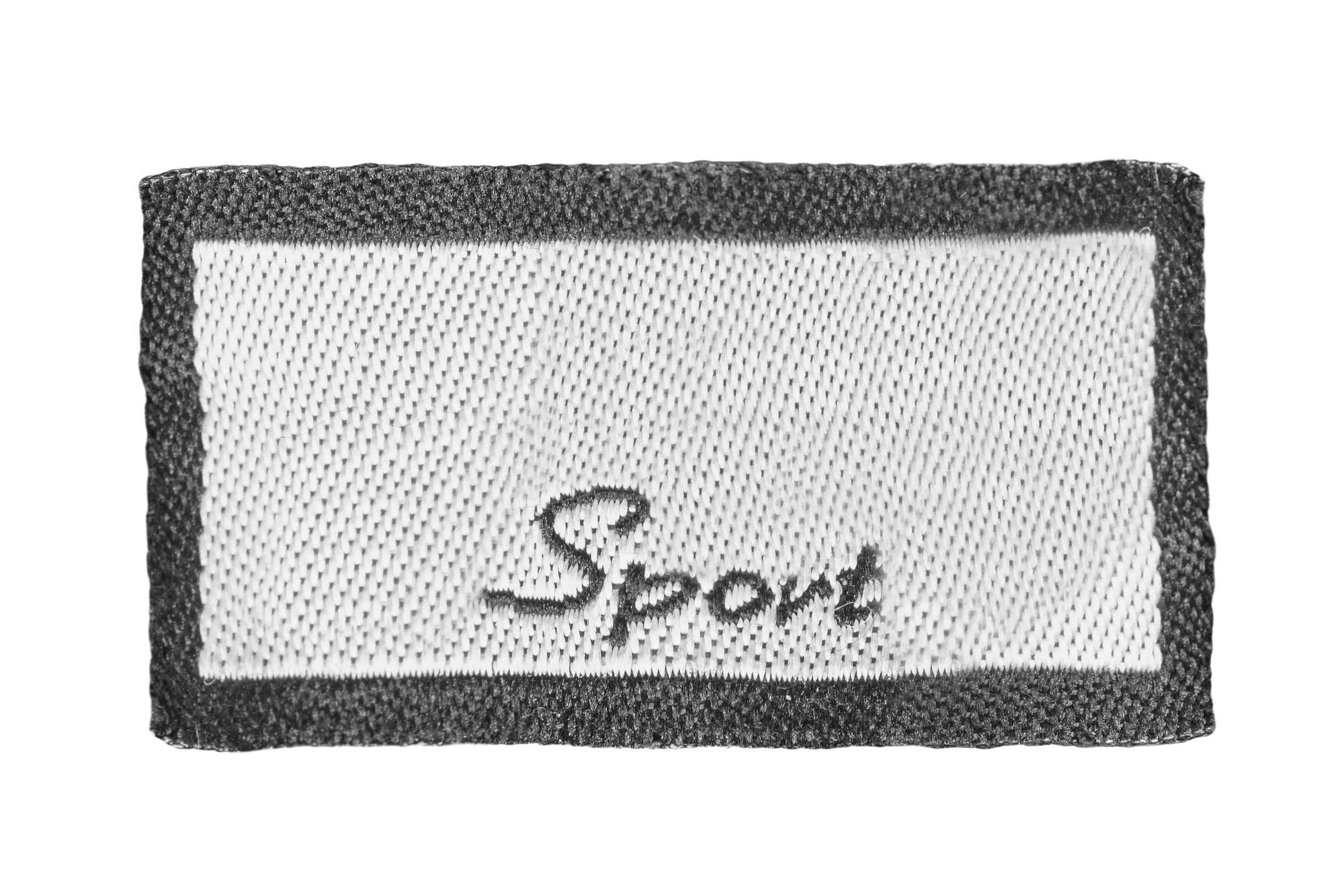 Sportswear with technical embroidered label